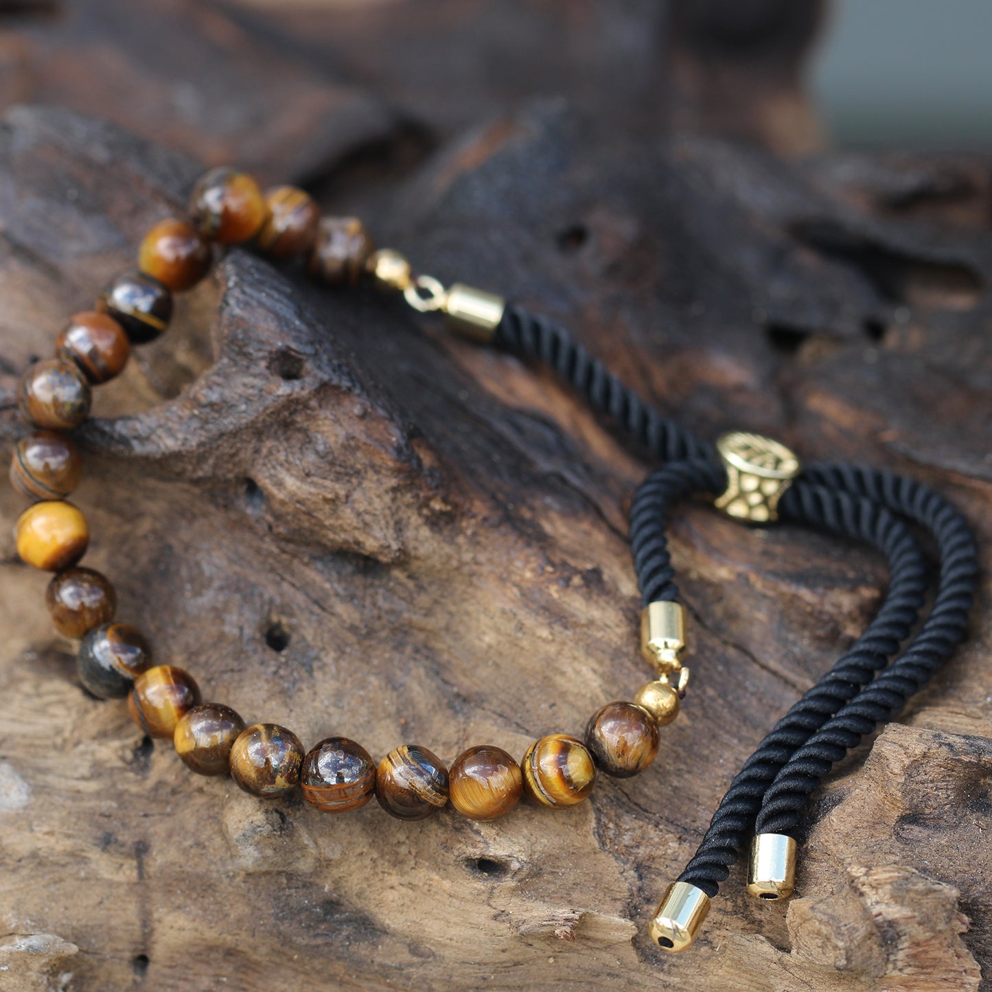 Ares – 18K Gold Plated Tiger’s Eye Black String Bracelet